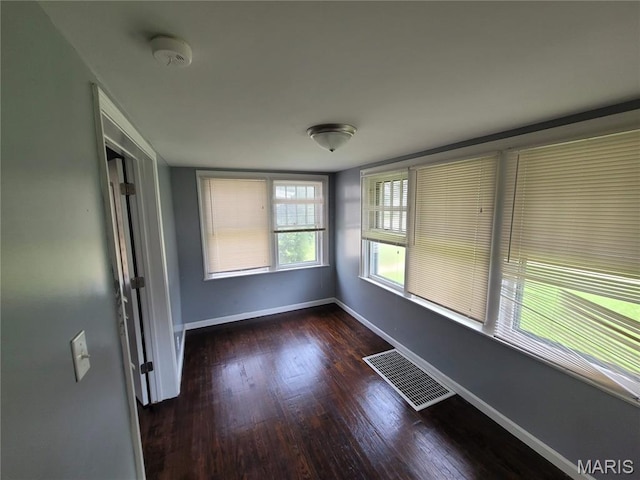 2965 Kincaid Ave, St John, MO 63114 - unfurnished room with wood finished floors and a smoke detector