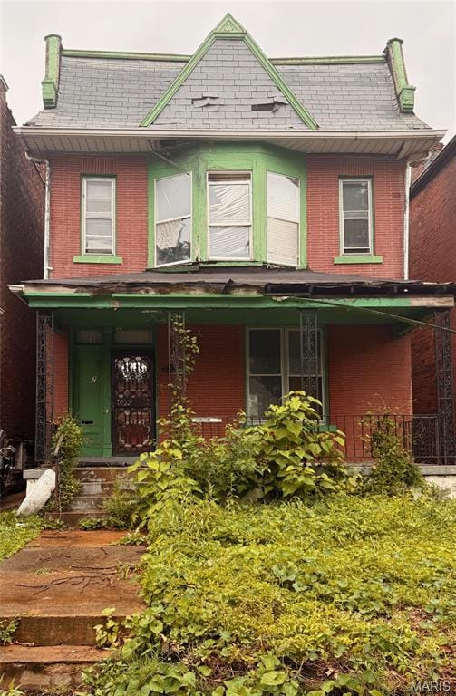 4017 Maffitt Ave, Saint Louis, MO 63113 - view of front of home with brick siding and a porch