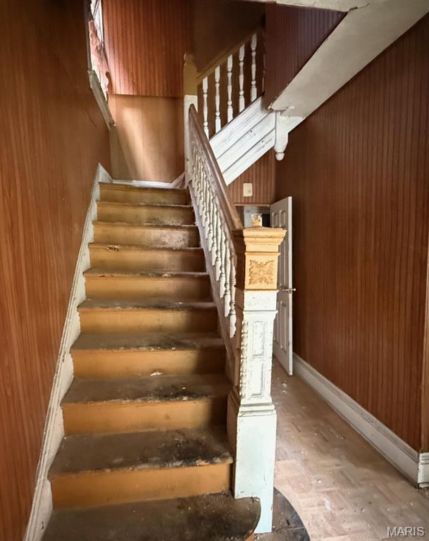 4017 Maffitt Ave, Saint Louis, MO 63113 - stairs featuring wood walls
