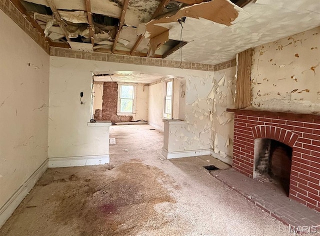 4017 Maffitt Ave, Saint Louis, MO 63113 - unfurnished living room with a brick fireplace