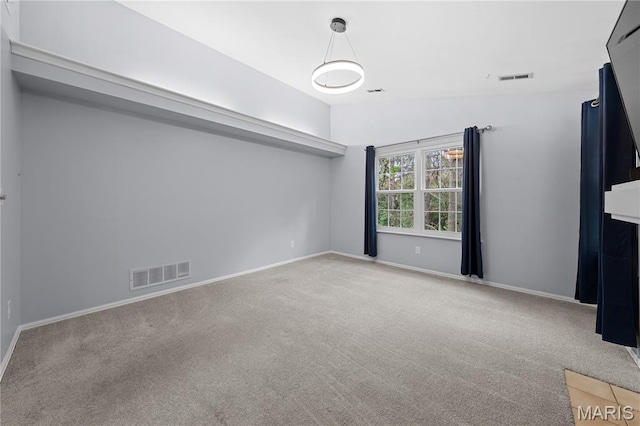 12107 Autumn Lakes Dr, Maryland Heights, MO 63043 - carpeted spare room featuring baseboards and lofted ceiling