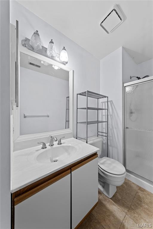 12107 Autumn Lakes Dr, Maryland Heights, MO 63043 - full bathroom with vanity and a stall shower