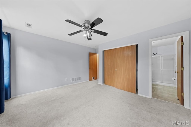 12107 Autumn Lakes Dr, Maryland Heights, MO 63043 - unfurnished bedroom with carpet, a closet, ensuite bathroom, and a ceiling fan