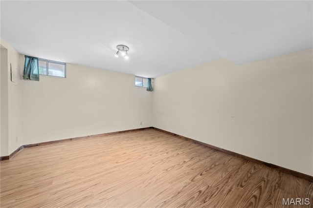 12107 Autumn Lakes Dr, Maryland Heights, MO 63043 - basement with light wood-style flooring and healthy amount of natural light