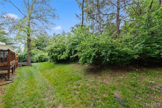 12107 Autumn Lakes Dr, Maryland Heights, MO 63043 - view of grassy yard with a wooden deck