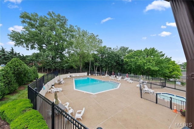 12107 Autumn Lakes Dr, Maryland Heights, MO 63043 - community pool featuring a patio and view of scattered trees