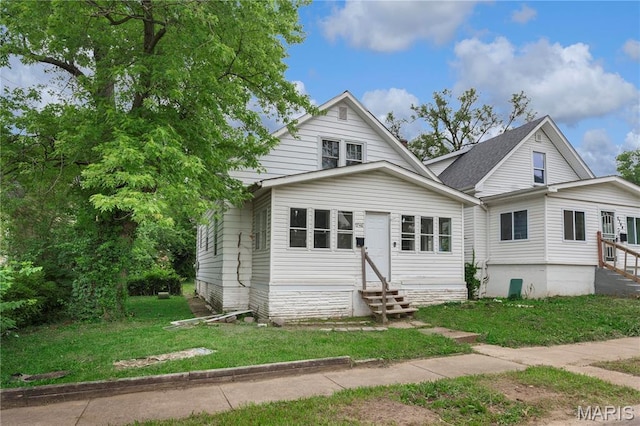 5746 Acme, Jennings, MO 63136 - view of front facade with entry steps and a front lawn