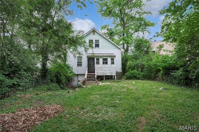 5746 Acme, Jennings, MO 63136 - rear view of property with a yard