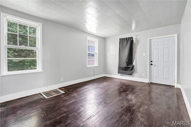 5746 Acme, Jennings, MO 63136 - unfurnished room with wood-type flooring and wood walls