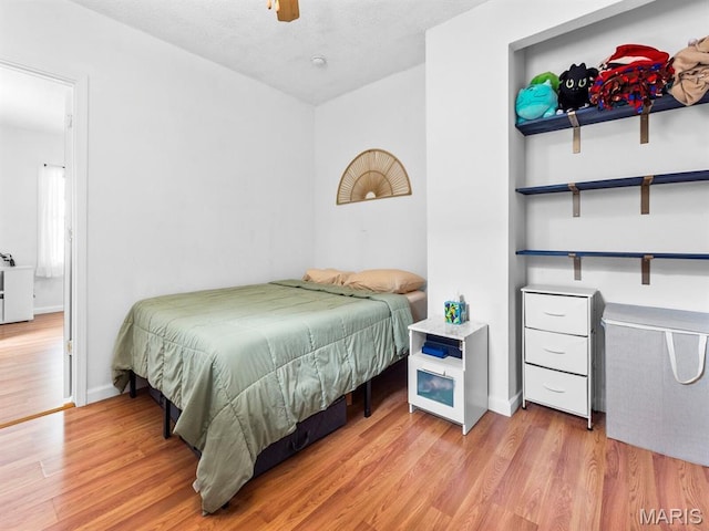 414 Plum St, Edwardsville, IL 62025 - bedroom with wood finished floors and ceiling fan