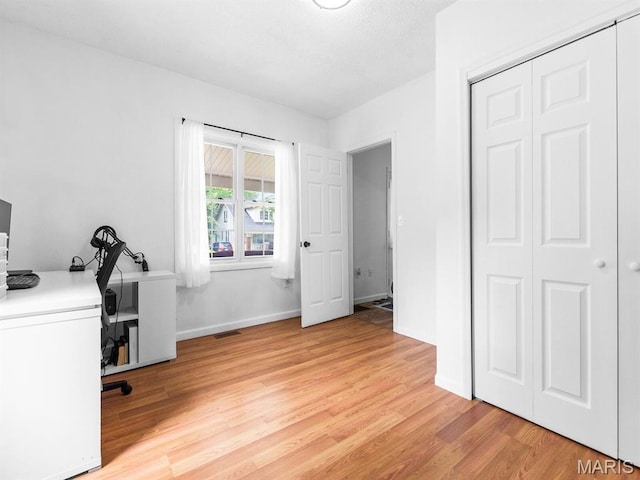 414 Plum St, Edwardsville, IL 62025 - unfurnished office with light wood finished floors and baseboards