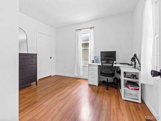 414 Plum St, Edwardsville, IL 62025 - office space featuring light wood finished floors and a textured ceiling