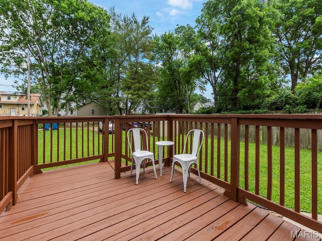414 Plum St, Edwardsville, IL 62025 - wooden terrace featuring a lawn