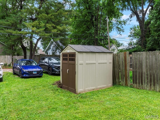 414 Plum St, Edwardsville, IL 62025 - view of shed with a fenced backyard