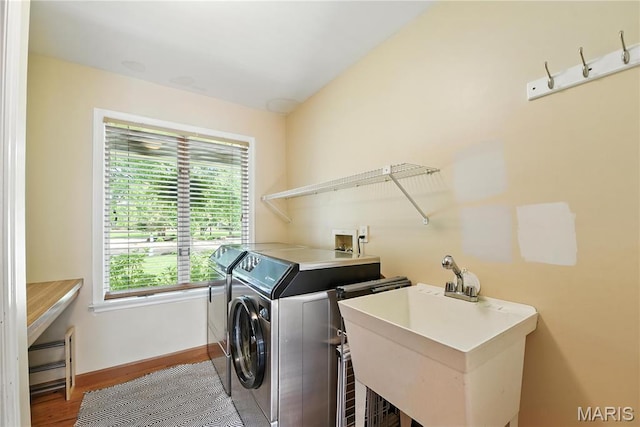 3 Morganfield Ct, Chesterfield, MO 63005 - laundry room with independent washer and dryer and wood finished floors