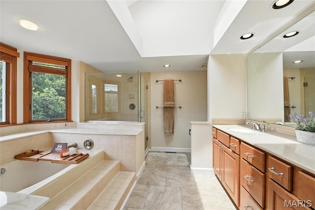 3 Morganfield Ct, Chesterfield, MO 63005 - full bathroom with vanity, a garden tub, a shower stall, and recessed lighting