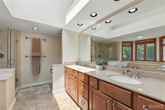 3 Morganfield Ct, Chesterfield, MO 63005 - full bath featuring a shower stall, recessed lighting, double vanity, tile patterned floors, and a bath