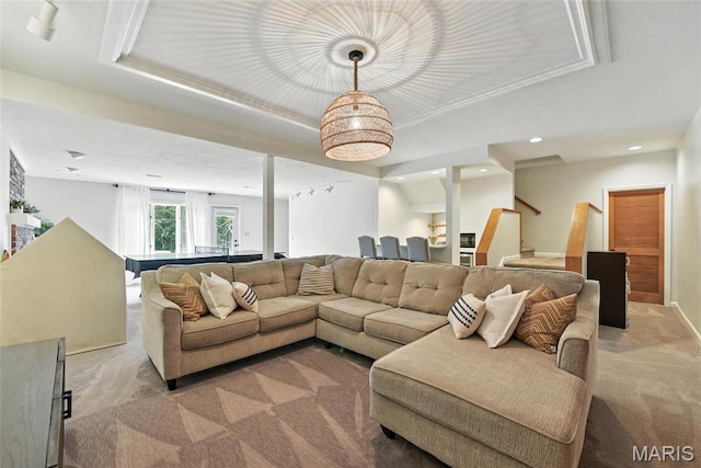 3 Morganfield Ct, Chesterfield, MO 63005 - living room featuring light colored carpet, stairway, recessed lighting, and a tray ceiling