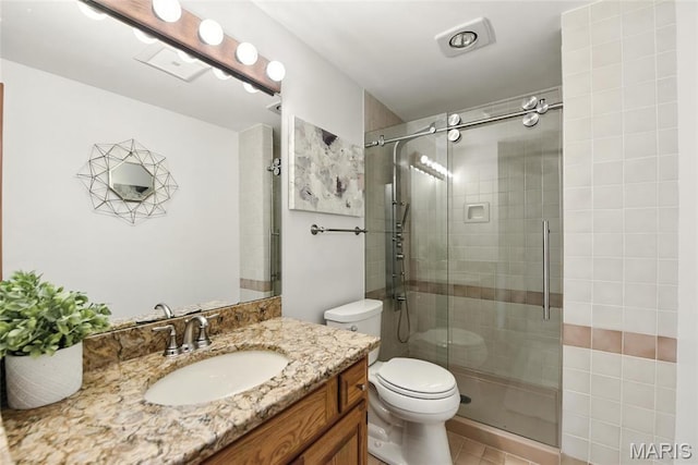 3 Morganfield Ct, Chesterfield, MO 63005 - bathroom featuring vanity, a tile shower, and tile patterned floors