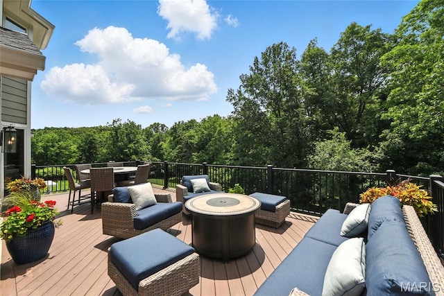 3 Morganfield Ct, Chesterfield, MO 63005 - wooden terrace with an outdoor living space with a fire pit, outdoor dining area, and a forest view