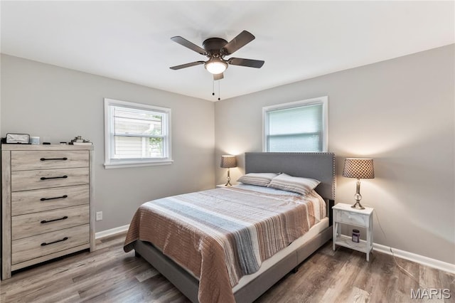 1140 Lindsay Ln, Florissant, MO 63031 - bedroom with wood finished floors and ceiling fan