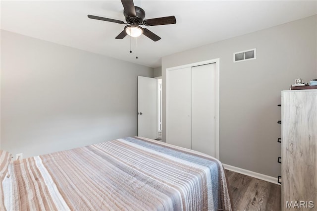 1140 Lindsay Ln, Florissant, MO 63031 - bedroom featuring wood finished floors, a closet, and a ceiling fan