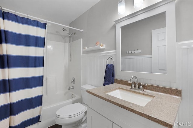 6232 Clover Lake Dr, Cedar Hill, MO 63016 - bathroom featuring vanity, a wainscoted wall, and shower / tub combo with curtain