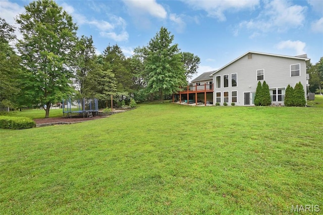 6232 Clover Lake Dr, Cedar Hill, MO 63016 - view of grassy yard featuring a trampoline and a deck