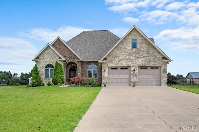 108 Jennings Ln, Sikeston, MO 63801 - craftsman-style house with concrete driveway, stone siding, and a front lawn