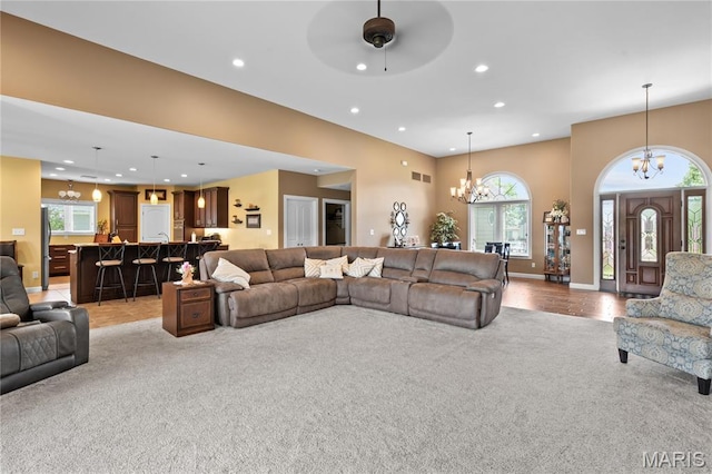 108 Jennings Ln, Sikeston, MO 63801 - living area with light colored carpet, a chandelier, recessed lighting, plenty of natural light, and ceiling fan
