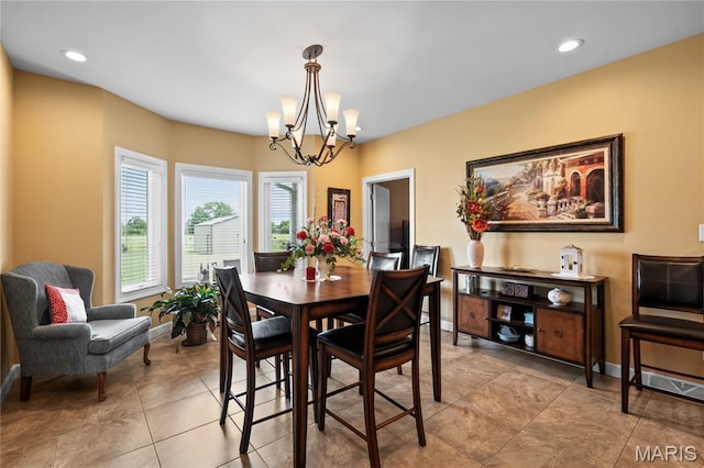 108 Jennings Ln, Sikeston, MO 63801 - dining space with a chandelier, recessed lighting, and light tile patterned flooring