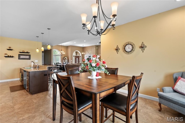 108 Jennings Ln, Sikeston, MO 63801 - dining space featuring a chandelier and light tile patterned floors