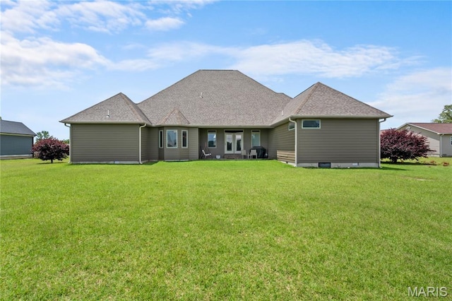 108 Jennings Ln, Sikeston, MO 63801 - back of house with a lawn and a shingled roof