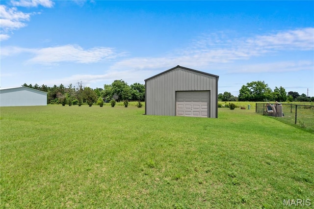 108 Jennings Ln, Sikeston, MO 63801 - view of yard with a detached garage and an outbuilding