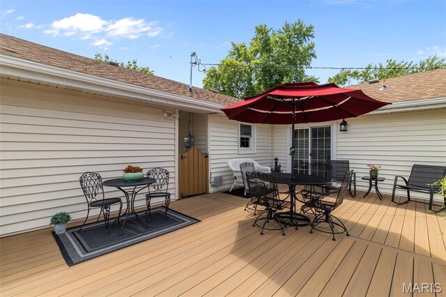 111 Freedom Dr, Belleville, IL 62226 - wooden terrace featuring outdoor dining area