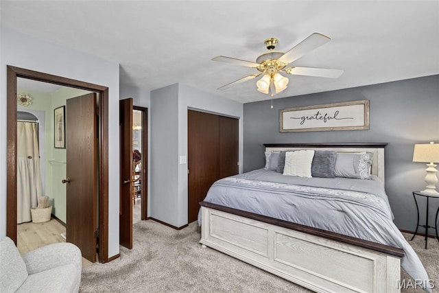 111 Freedom Dr, Belleville, IL 62226 - carpeted bedroom with a closet, ceiling fan, and ensuite bathroom