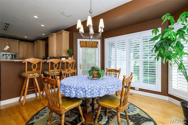 1001 Laurel Bend Ct S, Kirkwood, MO 63122 - dining room featuring light wood-style floors, a chandelier, and recessed lighting