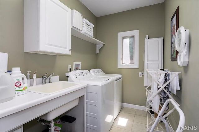 1001 Laurel Bend Ct S, Kirkwood, MO 63122 - laundry room with cabinet space, washer and clothes dryer, and light tile patterned floors