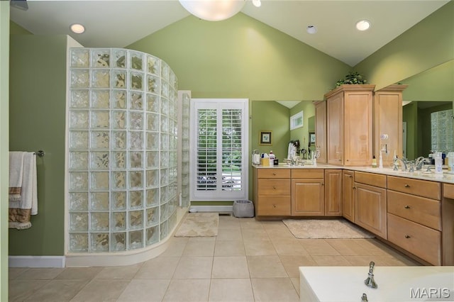 1001 Laurel Bend Ct S, Kirkwood, MO 63122 - bathroom with vaulted ceiling, vanity, walk in shower, tile patterned flooring, and a bath