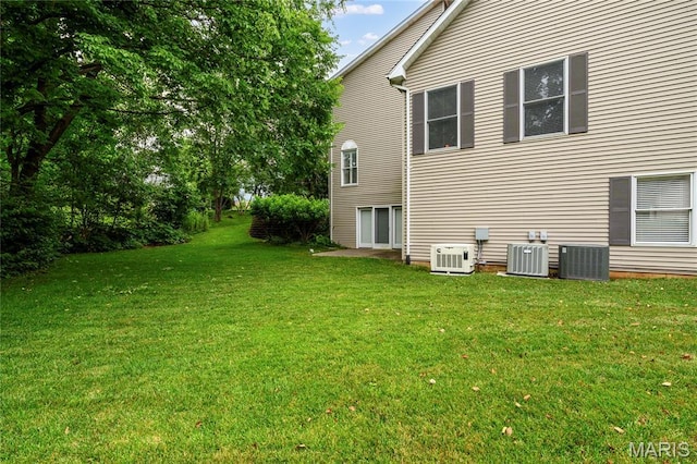 1001 Laurel Bend Ct S, Kirkwood, MO 63122 - view of side of home with a lawn and a central AC unit