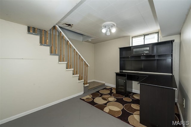 4322 Heidelberg Ave, Saint Louis, MO 63123 - unfurnished office featuring concrete floors and baseboards