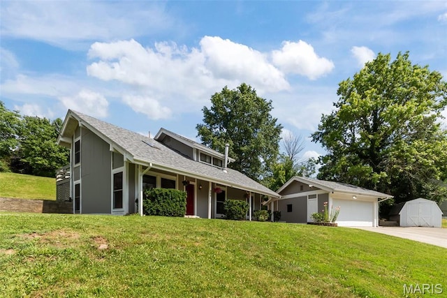 404 Applestone Dr, Ballwin, MO 63021 - view of front of home featuring a front lawn, driveway, and a storage shed