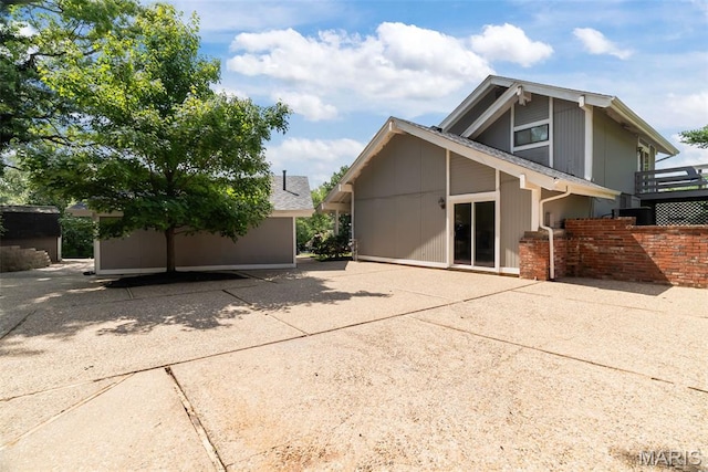 404 Applestone Dr, Ballwin, MO 63021 - view of property exterior with a patio