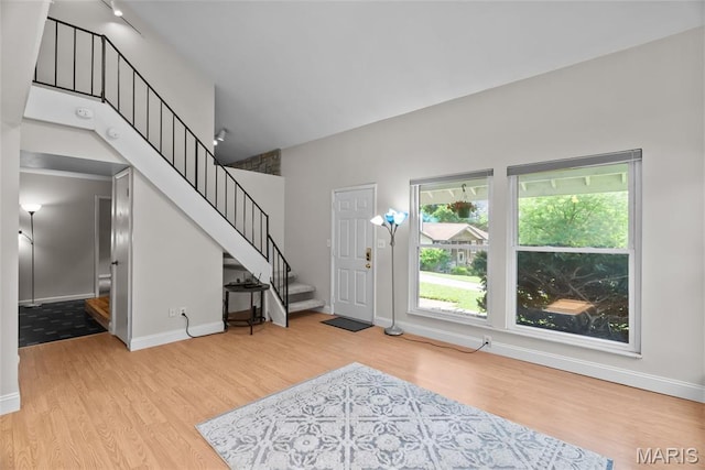 404 Applestone Dr, Ballwin, MO 63021 - foyer featuring wood finished floors and stairway