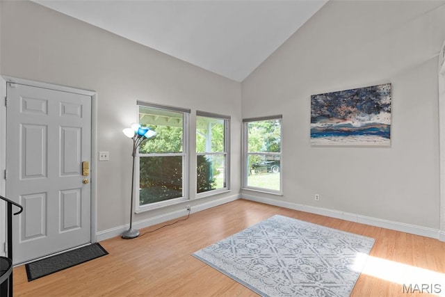 404 Applestone Dr, Ballwin, MO 63021 - foyer featuring high vaulted ceiling and wood finished floors
