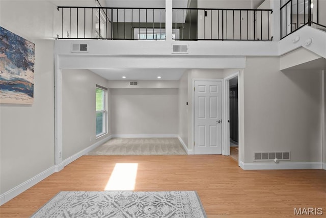 404 Applestone Dr, Ballwin, MO 63021 - foyer entrance featuring wood finished floors and a towering ceiling