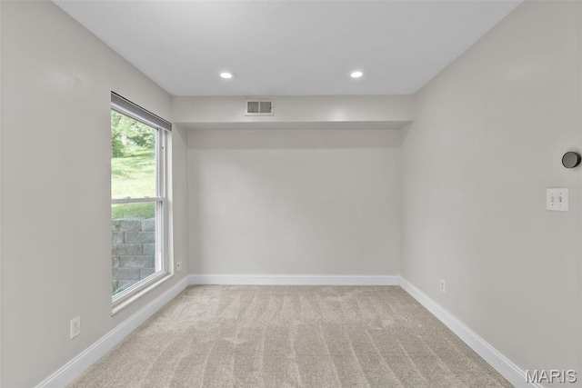 404 Applestone Dr, Ballwin, MO 63021 - spare room with light colored carpet and recessed lighting