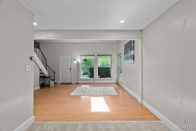 404 Applestone Dr, Ballwin, MO 63021 - foyer featuring stairs, recessed lighting, and wood finished floors