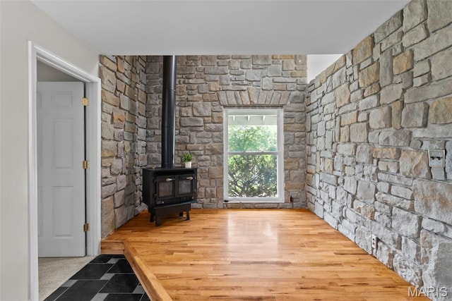 404 Applestone Dr, Ballwin, MO 63021 - unfurnished living room featuring a wood stove