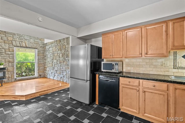 404 Applestone Dr, Ballwin, MO 63021 - kitchen featuring stainless steel appliances, backsplash, and dark stone countertops